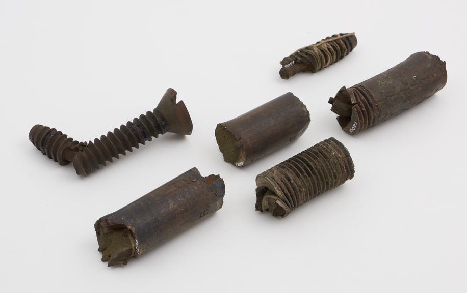 Samples of broken screws showing the molecular changes in Muntz