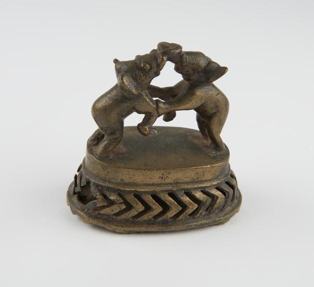 Foot scraper, brass, two elephants for handle, Indian, 1801-1900