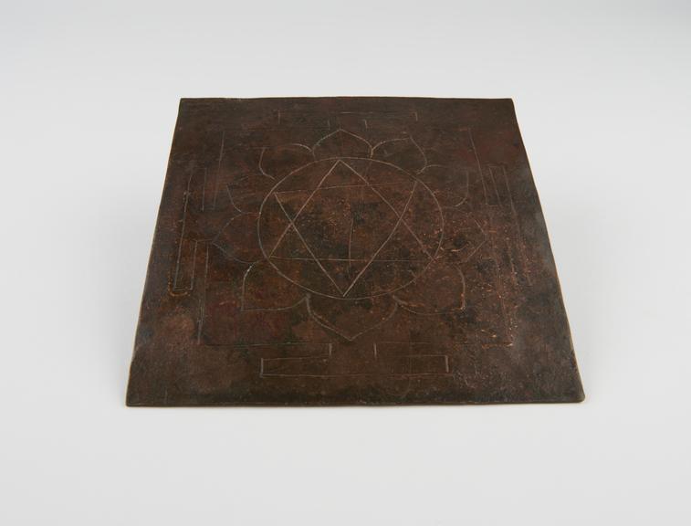 Square double-sided hindu meditation plaque called a yantra