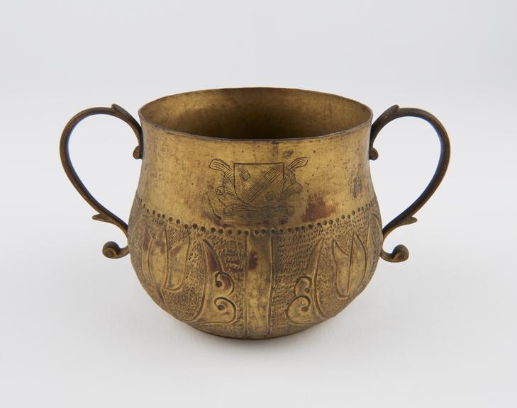 Small brass vessel with two loop handles