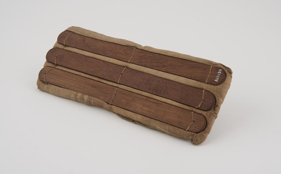 Padded splint, oak bracing pieces, by Aitken of York, 1910-1918