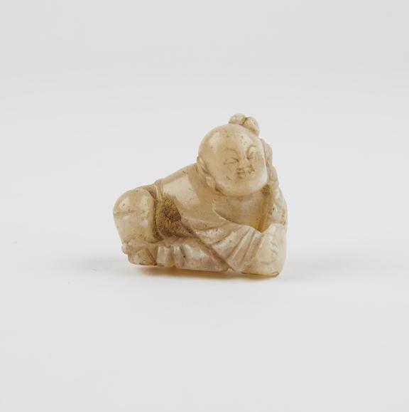 Wooden netsuke in the form of Tanuki the badger