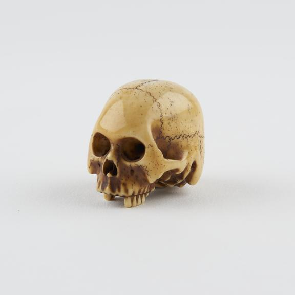 Ivory netsuke, in the form of a miniature human skull