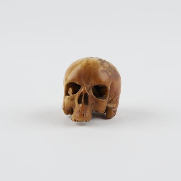 Ivory model of a human skull, possibly a netsuke