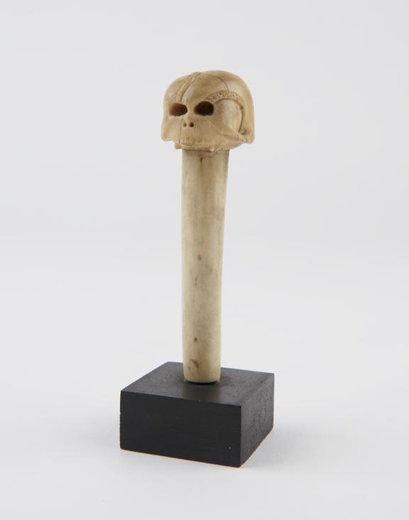 Bone or ivory skull, somewhat stylised