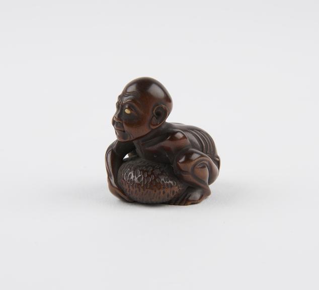 Wooden netsuke, in the form of a blind masseur