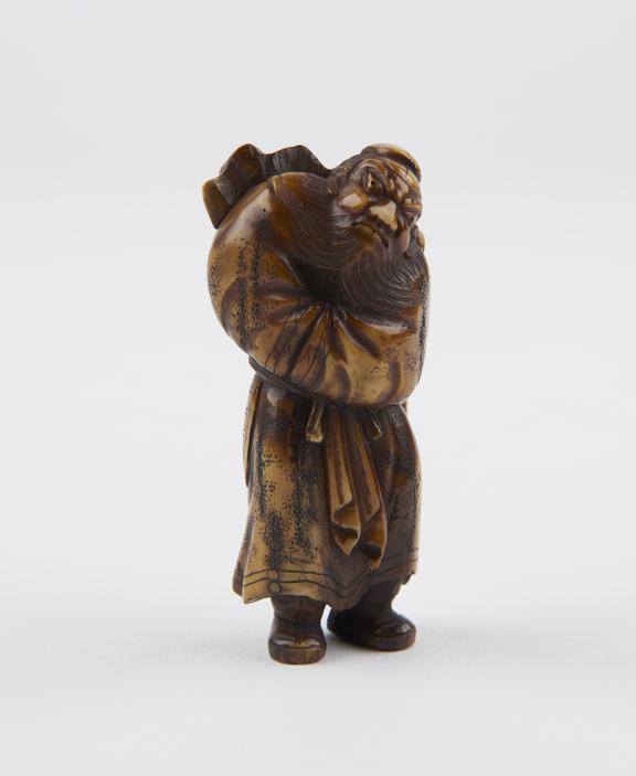 Ivory netsuke, in the form of Shoki, the demon queller