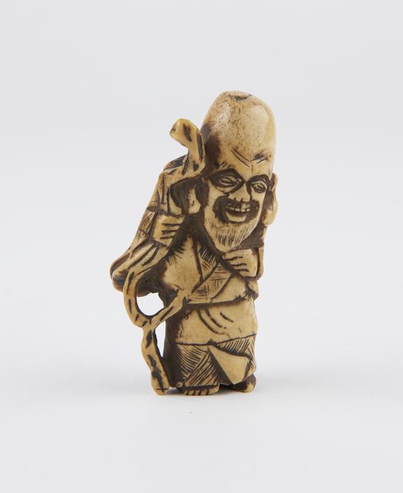 Bone netsuke, in the form of a bearded male