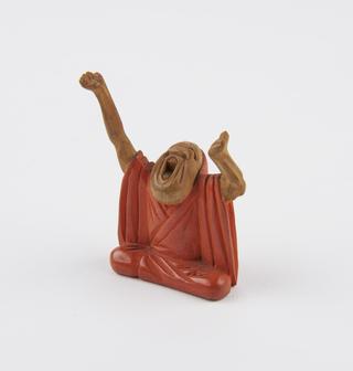 Netsuke in form of man yawning