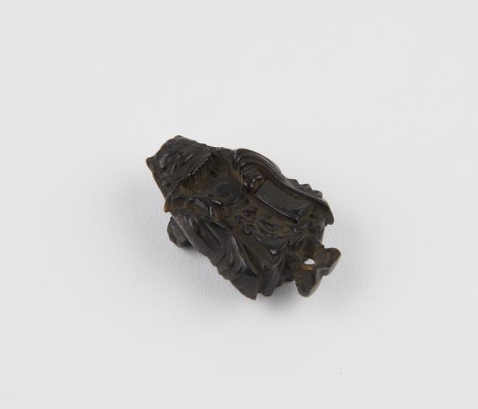 Ebony netsuke in the form of a demon