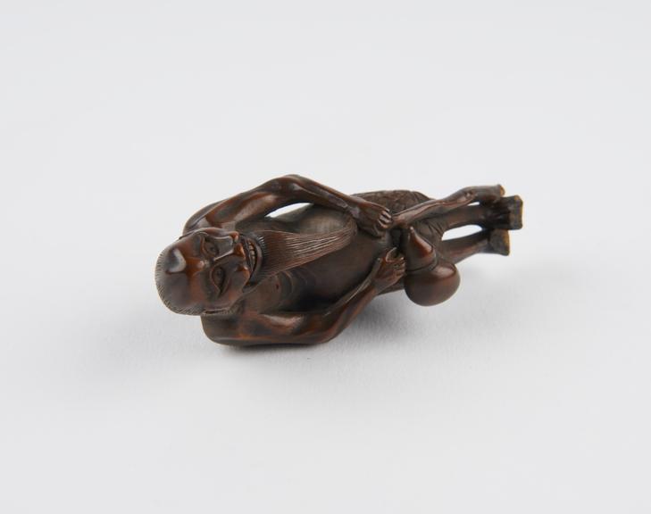 Wooden netsuke, in the form of Sennin, bearded