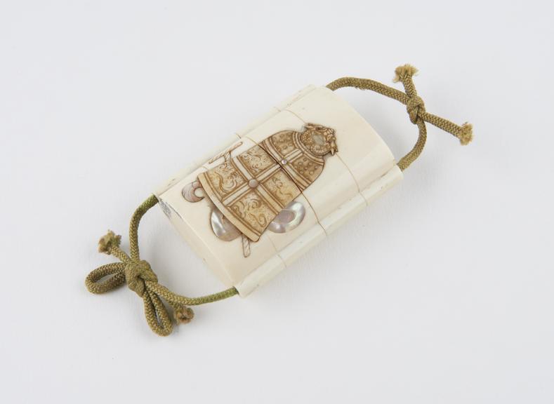 Ivory inro, inlaid with decorative mother-of-pearl bells