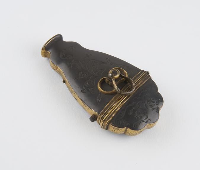 Bronze lancet case, with gilded band and edges