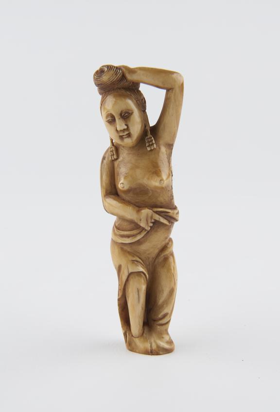 Ivory diagnostic figure, in the form of a recumbent woman