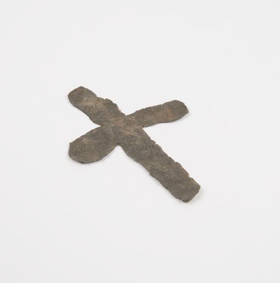 Crudely executed cross of lead