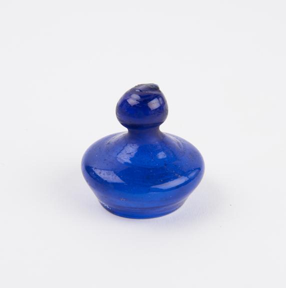 Blue glass lid with chipped knob finial, from Middle East