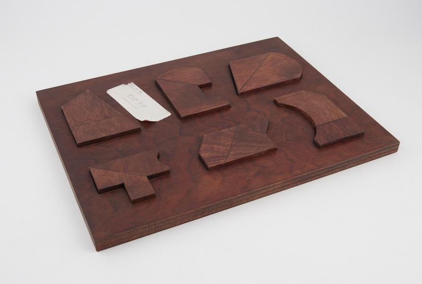 Wooden form board with various shapes