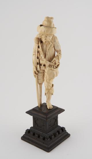 Ivory statue of a beggar