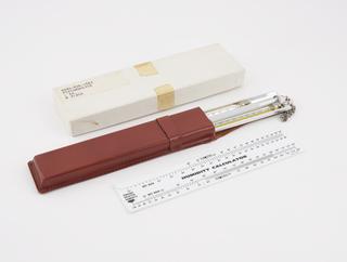 Psychrometer with white plastic slide rule humidity calculator