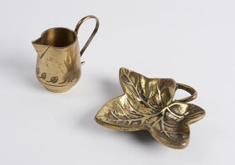 Leaf and jug figurines, associated with a 10hp two-cylinder Rolls Royce motorcar