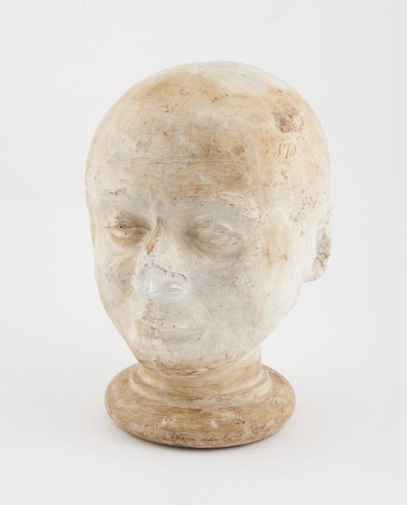 Plaster phrenological head of unidentified male, 19th century.