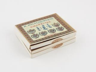 Cigarette box full of peg board pegs