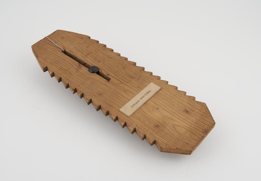 Sinclair foot splint, pine with iron slider, probably English