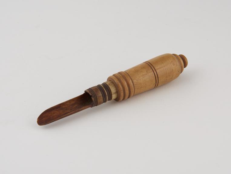 Apple scoop of bone with turned wooden handle