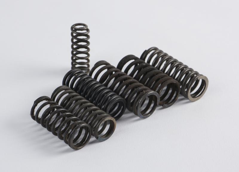 Seven metal springs from the three wheeled motor car, by Benz