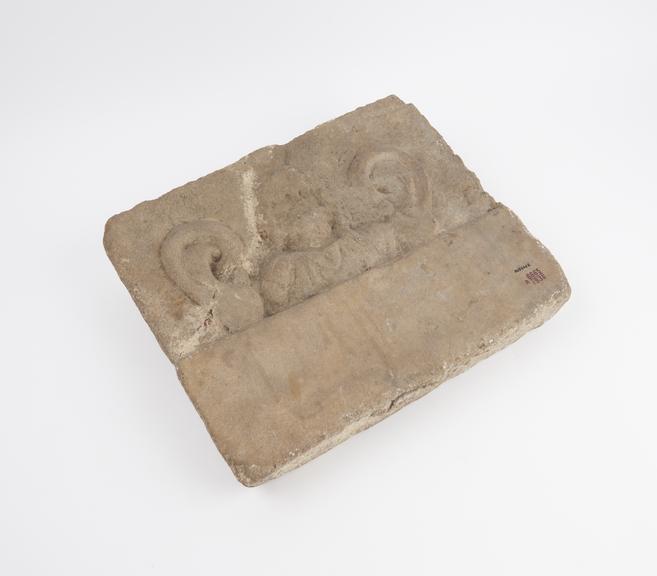 Marble votive plaque with relief bust, possibly Serapis