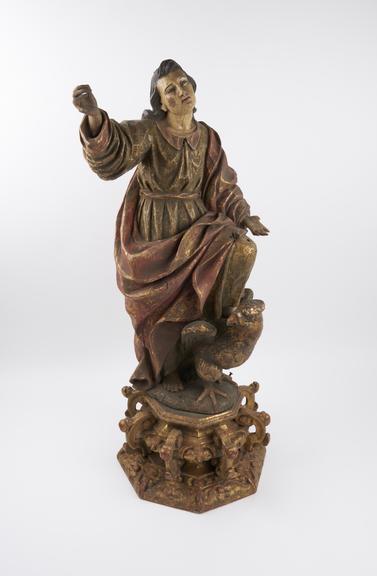 Wooden figure of Saint John the Evangelist, possibly Spanish