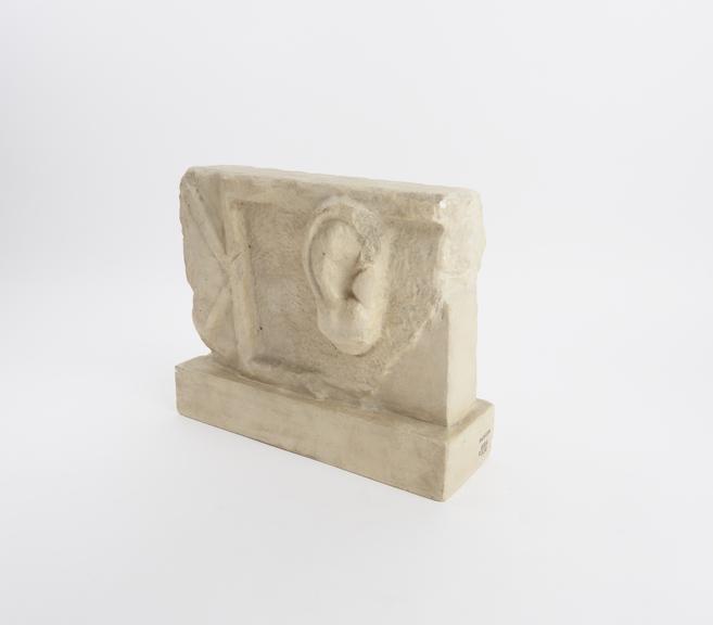 Votive plaque with right ear in relief