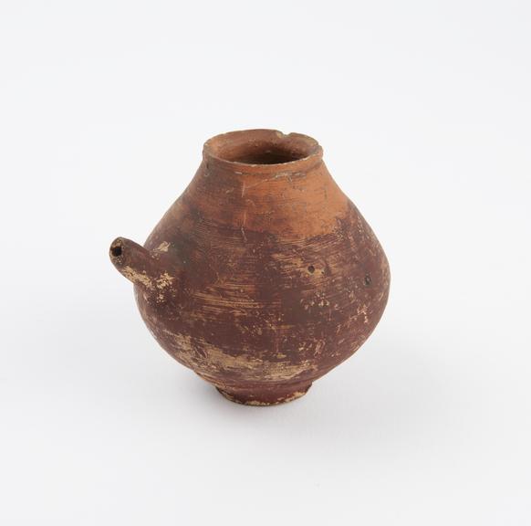 Pottery vessel, possibly a feeding bottle or lamp filler