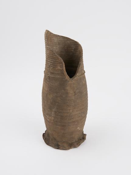 Pottery flask, oval body with flared thumb indented base