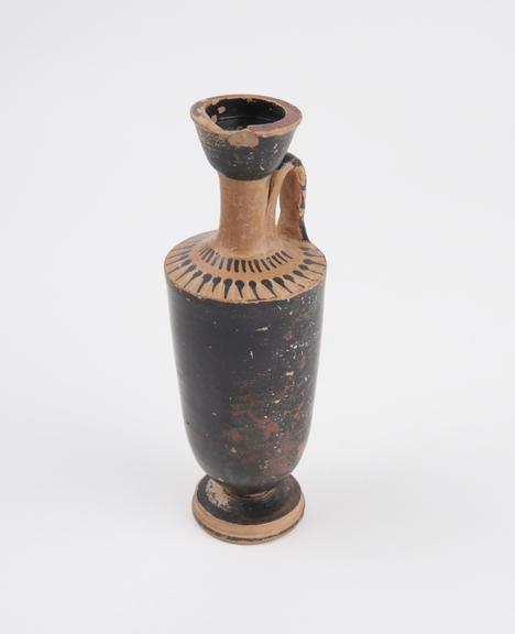 Late black figure lekythos, painted almost completely black