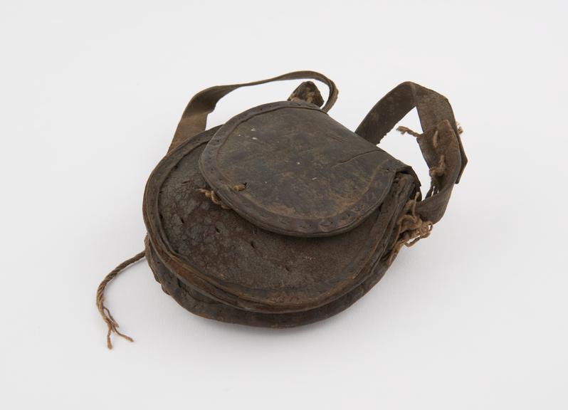 Firebag, consisting of leather pouch with strap