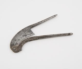 Betel nut cutter in back pocket