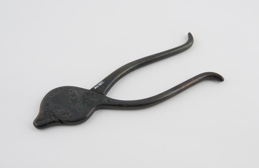 Copy of ancient tiger forceps, uyaghramukha svastika, metal