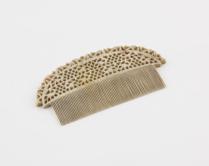 Ivory comb with fine teeth