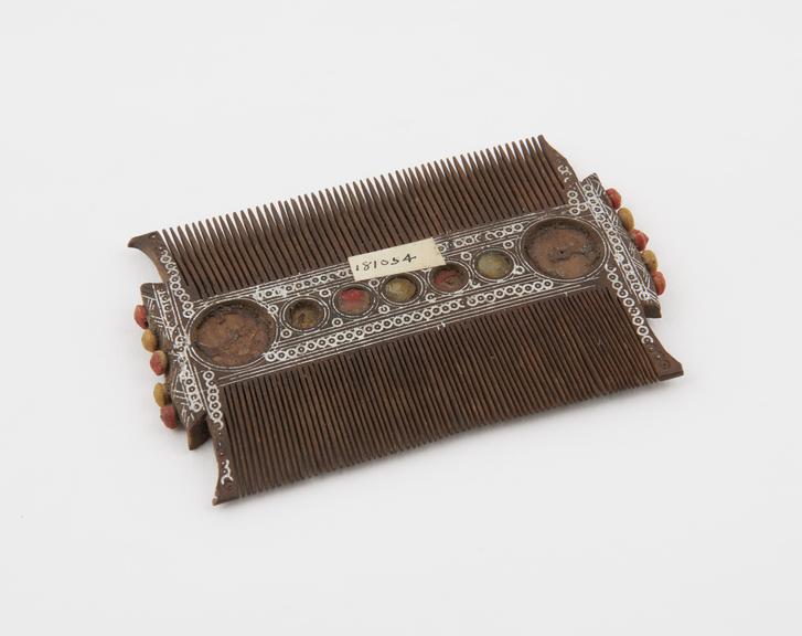 Carved wooden comb