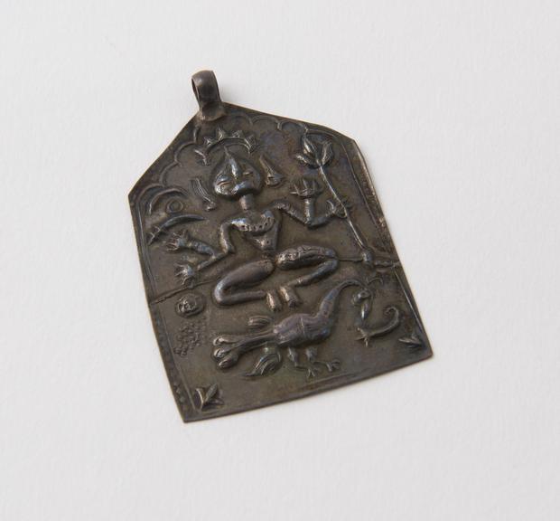 Silver amulet and pendant worn by Hindu pilgrims