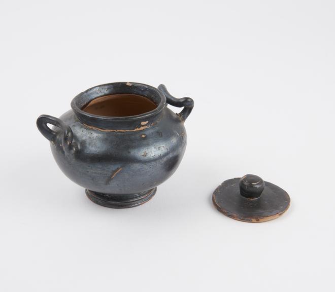 Pyxis, lidded, black glaze terracotta, two handles