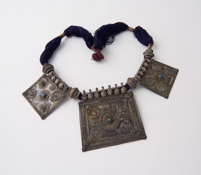 Amuletic necklace, 3 decorated silver pendants