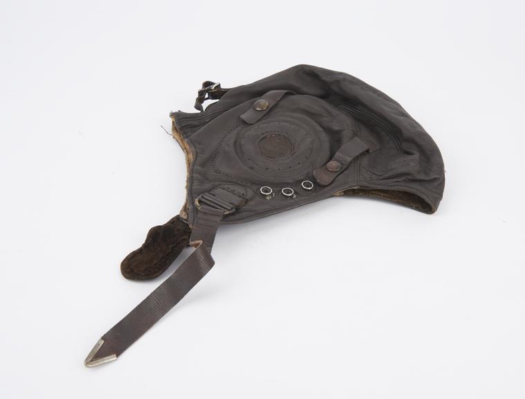 Leather flying helmet, with perforated ear patches