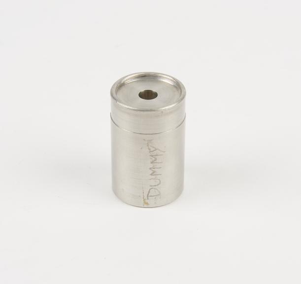 part of  machined cylindrical container with machined hole