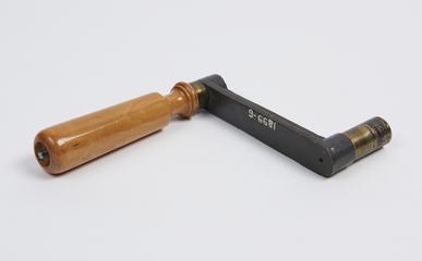 Brass winding handle for hydraulic sheer legs.