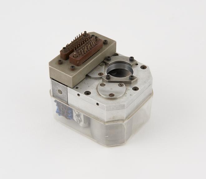 Experimental miniaturised tape recorder head with perspex cover