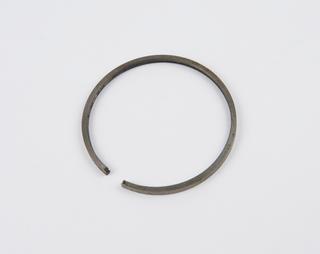 Perfex compression piston outer ring, 1920