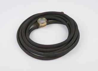 Hose and attached pressure gauge