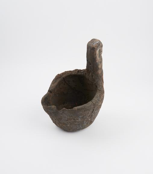 Large pottery ladle with short handle, Egyptian(?)